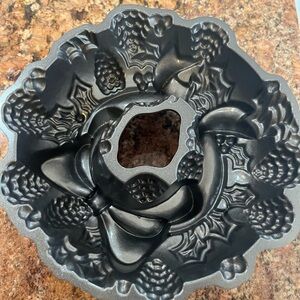 Festive Bundt Cake Pan with Bow and Pinecone Design